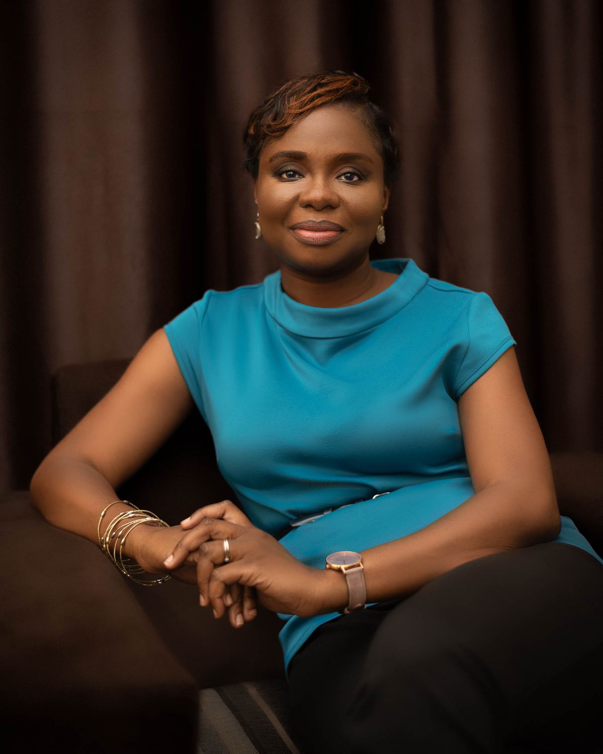 Adedolapo Osuntuyi seated portrait