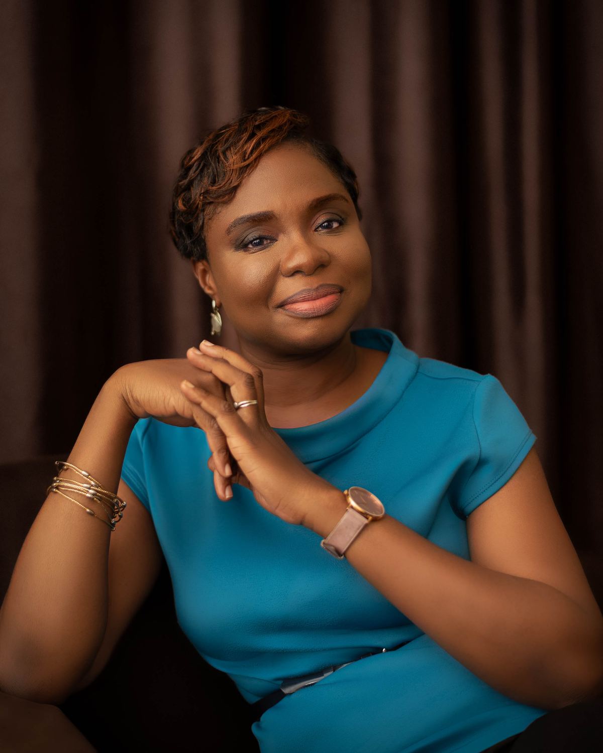 Adedolapo Osuntuyi portrait in teal